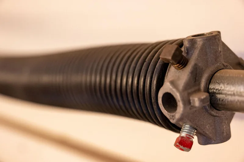 Garage door cable repair service by Santos & Sons technician in San Mateo